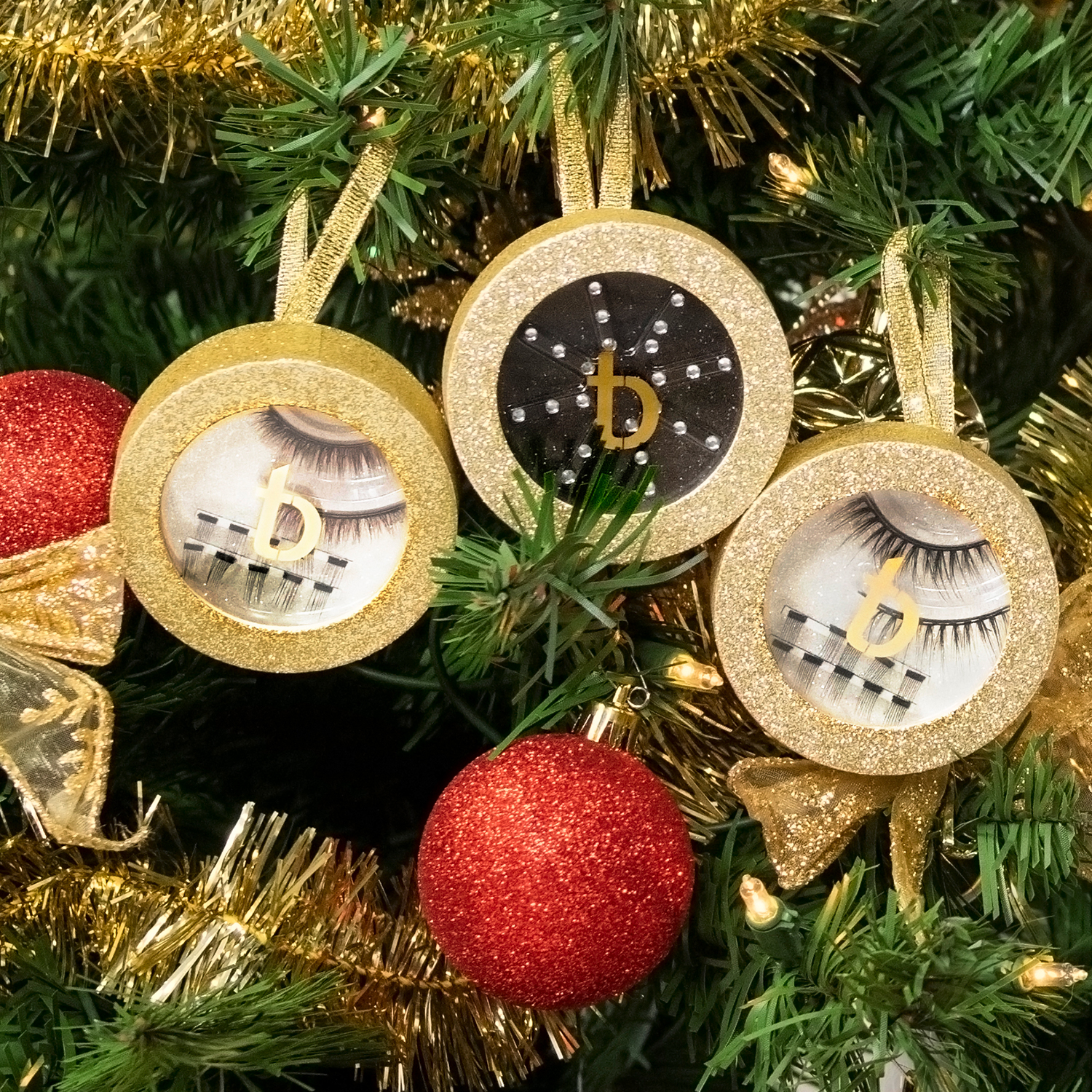 Holiday Luxe Bundle ornaments with lashes inside